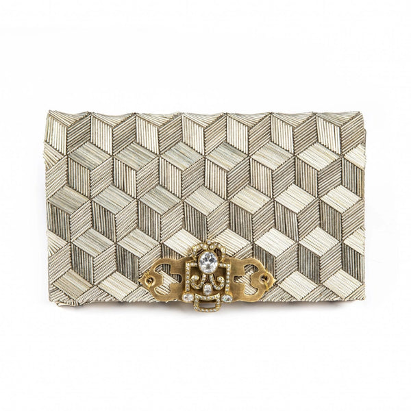 Patterned clutch bag with a gold clasp on a white background