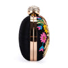 Black clutch with floral embroidery and gold accents on a white background