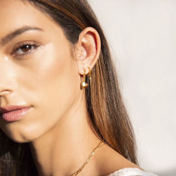 Boucles d'oreilles asymétriques | Réparer le cœur et le pansement