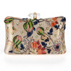 Decorative clutch bag with floral embroidery on a white background