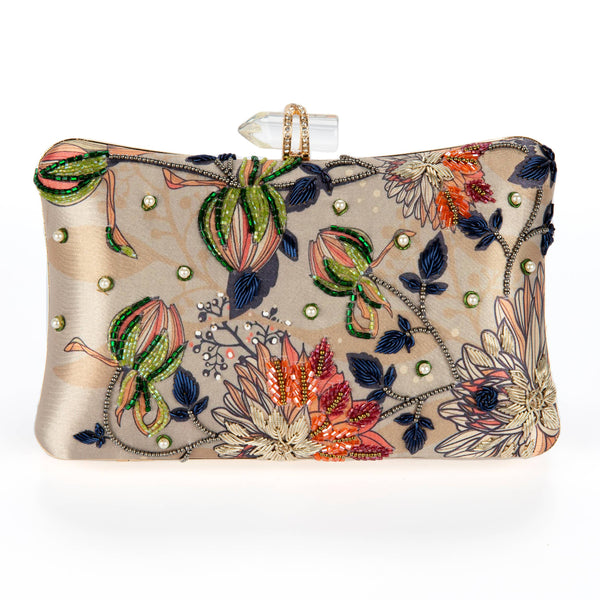 Decorative clutch bag with floral embroidery on a white background