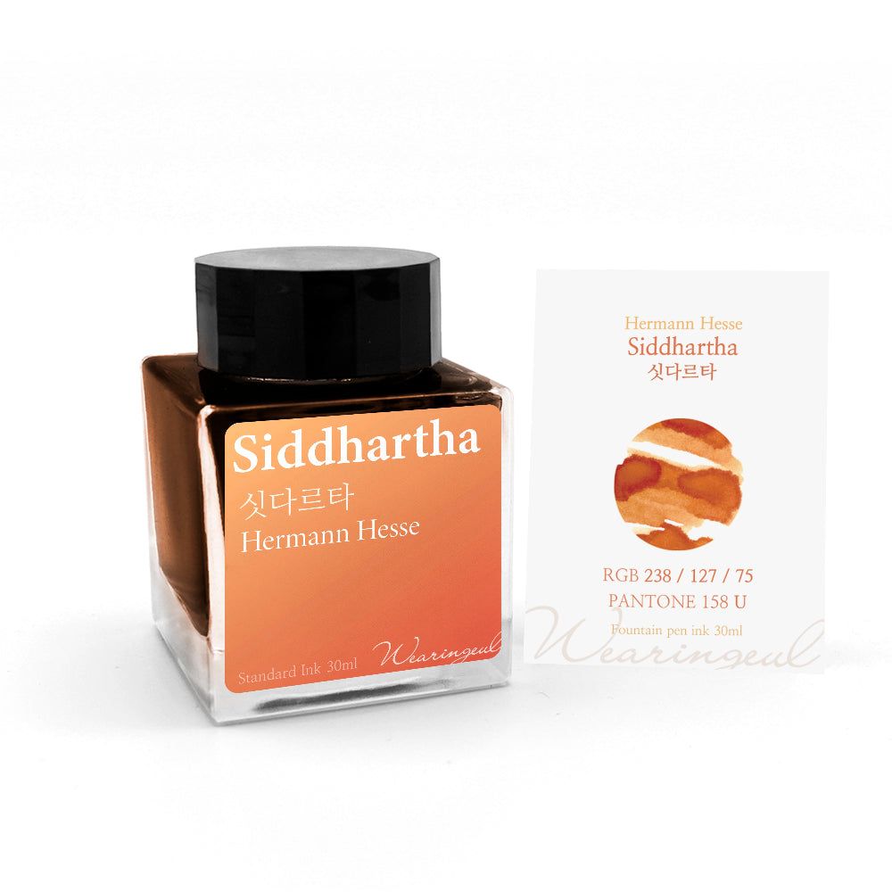 Ink bottle labeled 'Siddhartha' by Hermann Hesse with a matching box on a white background