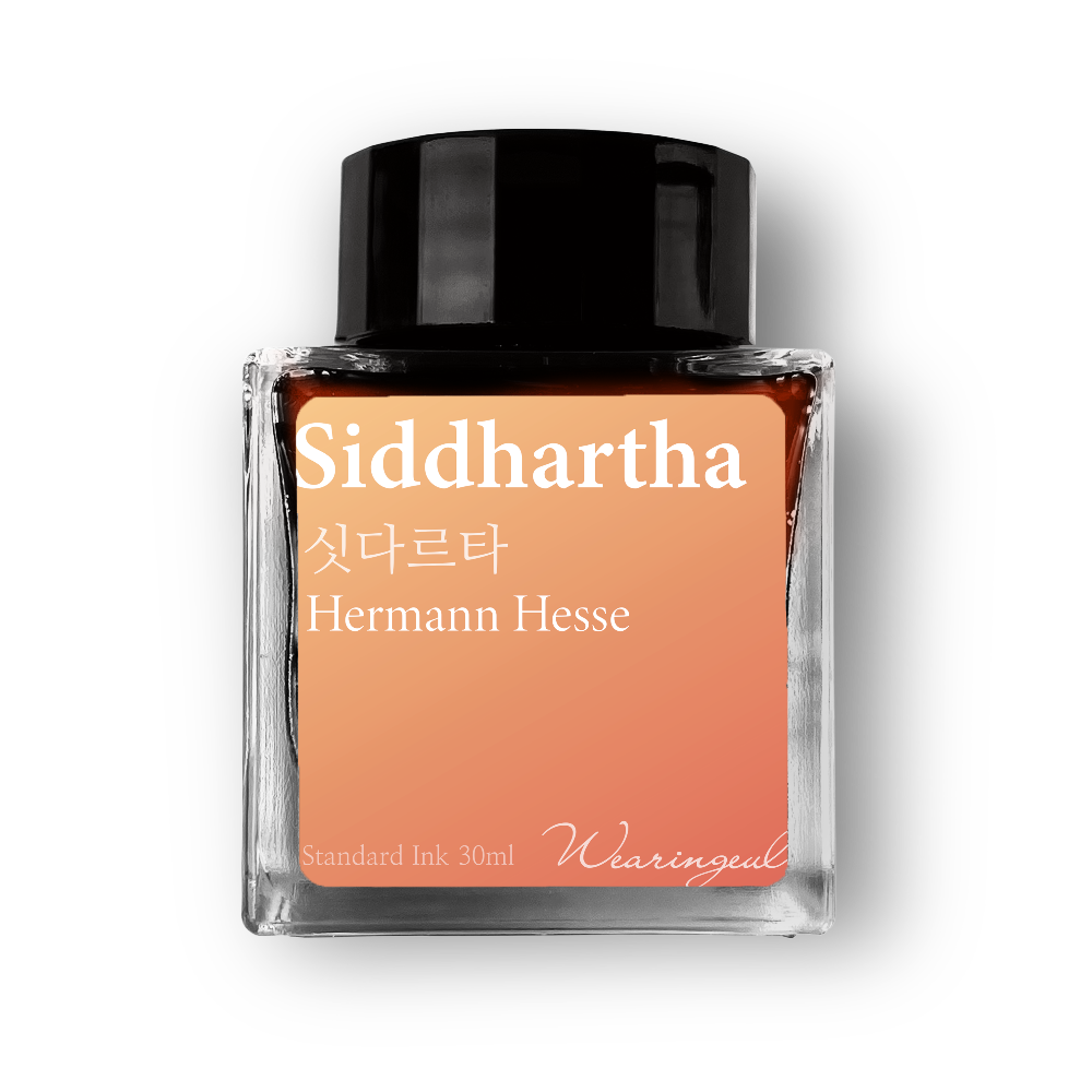 Ink bottle labeled 'Siddhartha' by Hermann Hesse with a black cap on a white background
