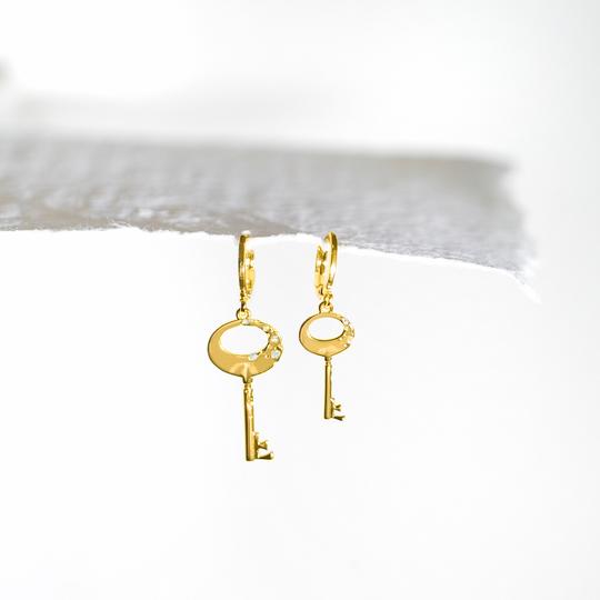 Boucles d'oreilles asymétriques | Clé de Fa
