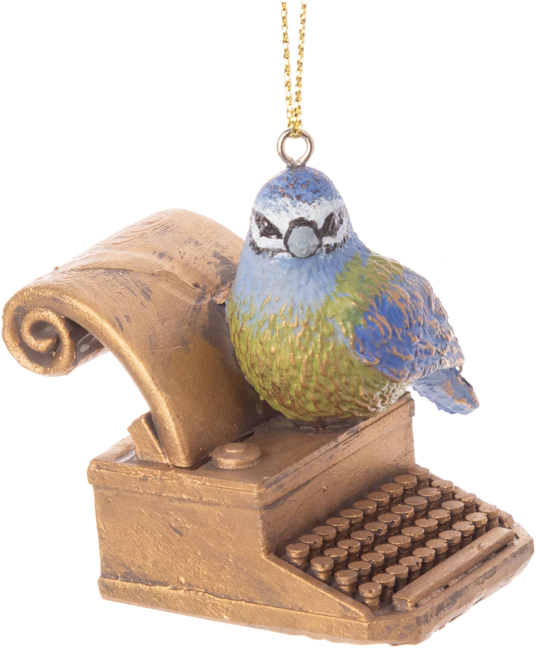 Oiseau sur des ornements de machine à écrire dorée