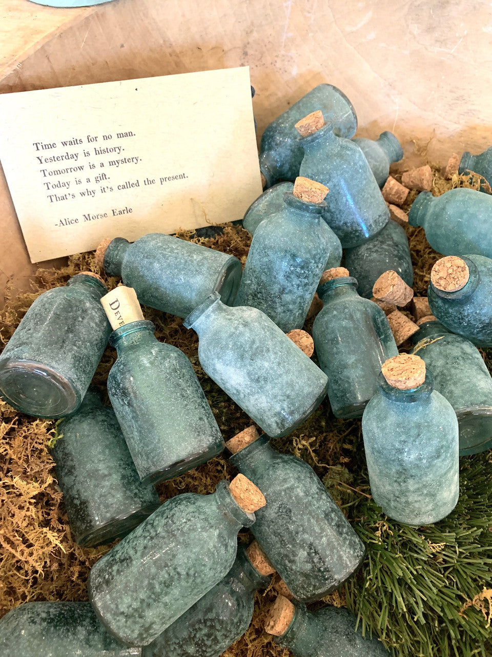 Mini bouteilles vertes givrées