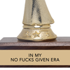 Gold trophy with wooden base and humorous text on a white background