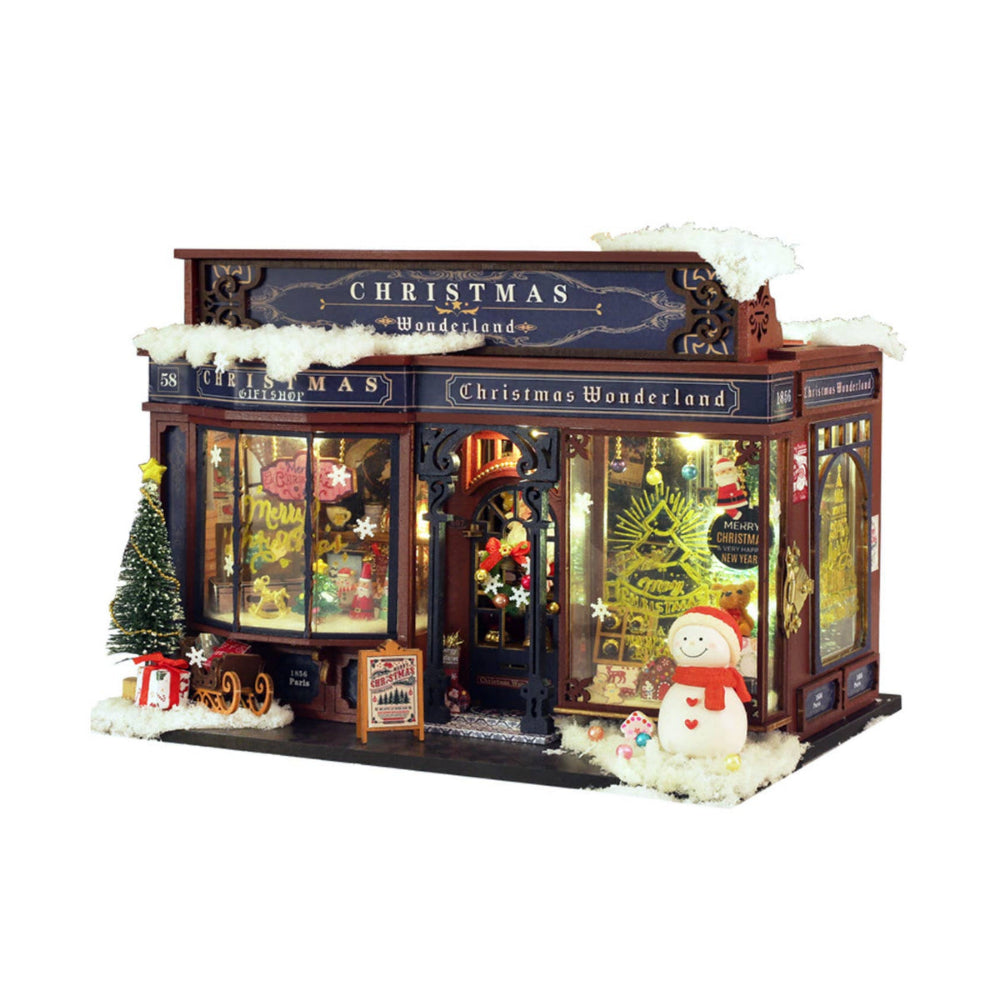 Christmas-themed miniature store with decorative elements on a white background
