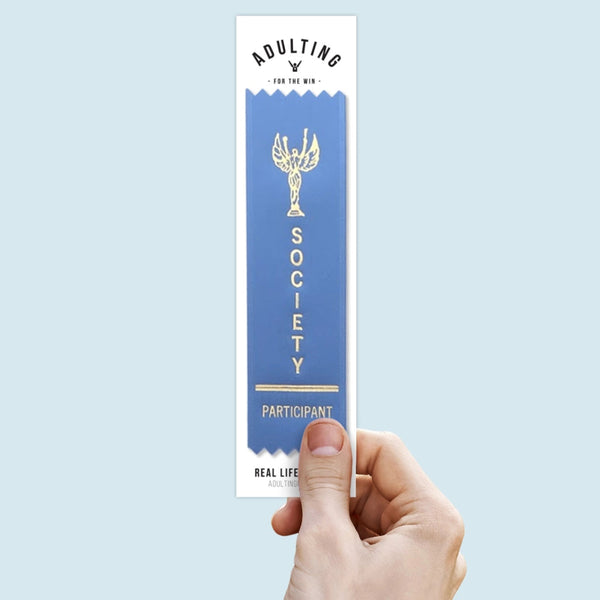 Hand holding an award ribbon with 'Society Participant' text on a light blue background