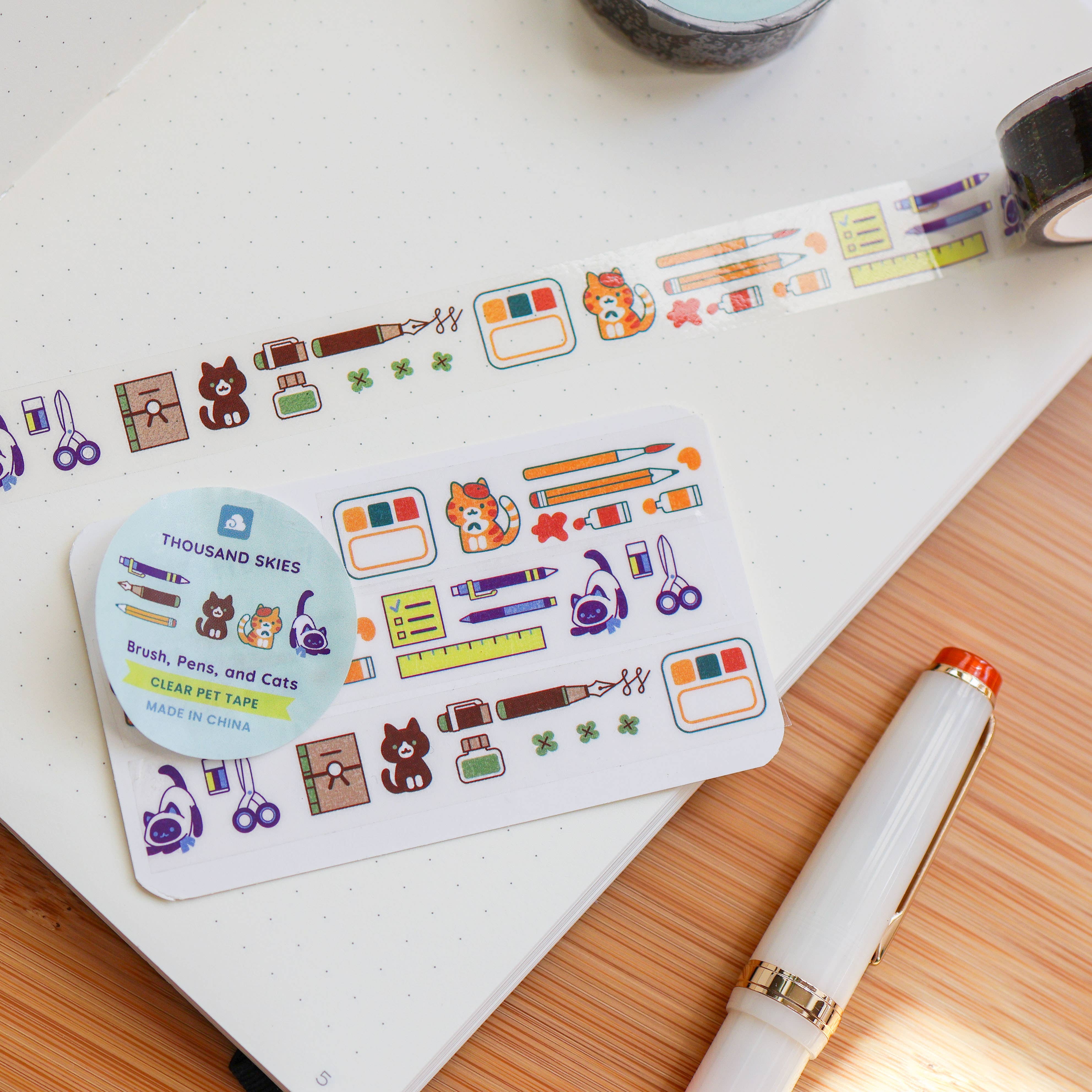 Brush, Pens, and Cats pet Tape