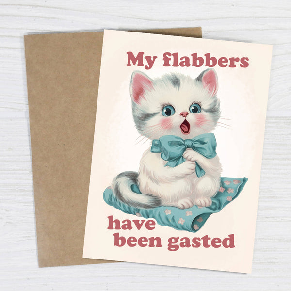 Greeting card with a vintage-style illustration of a kitten and humorous text on a white background.