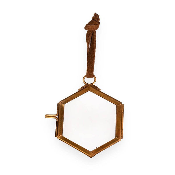 Hexagonal gold frame on a white background