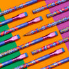 A set of colorful mechanical pencils arranged diagonally on a vibrant, geometric background of orange, green, and purple blocks. The pencils feature blue bodies with a busy, multicolored floral and swirl pattern, metallic pink erasers, and white text reading 'BLACKWING 2143'.
