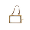 Gold rectangular photo frame with a string on a white background