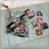 Vintage Ephemera-Filled Glass Heart with Cord Hanger