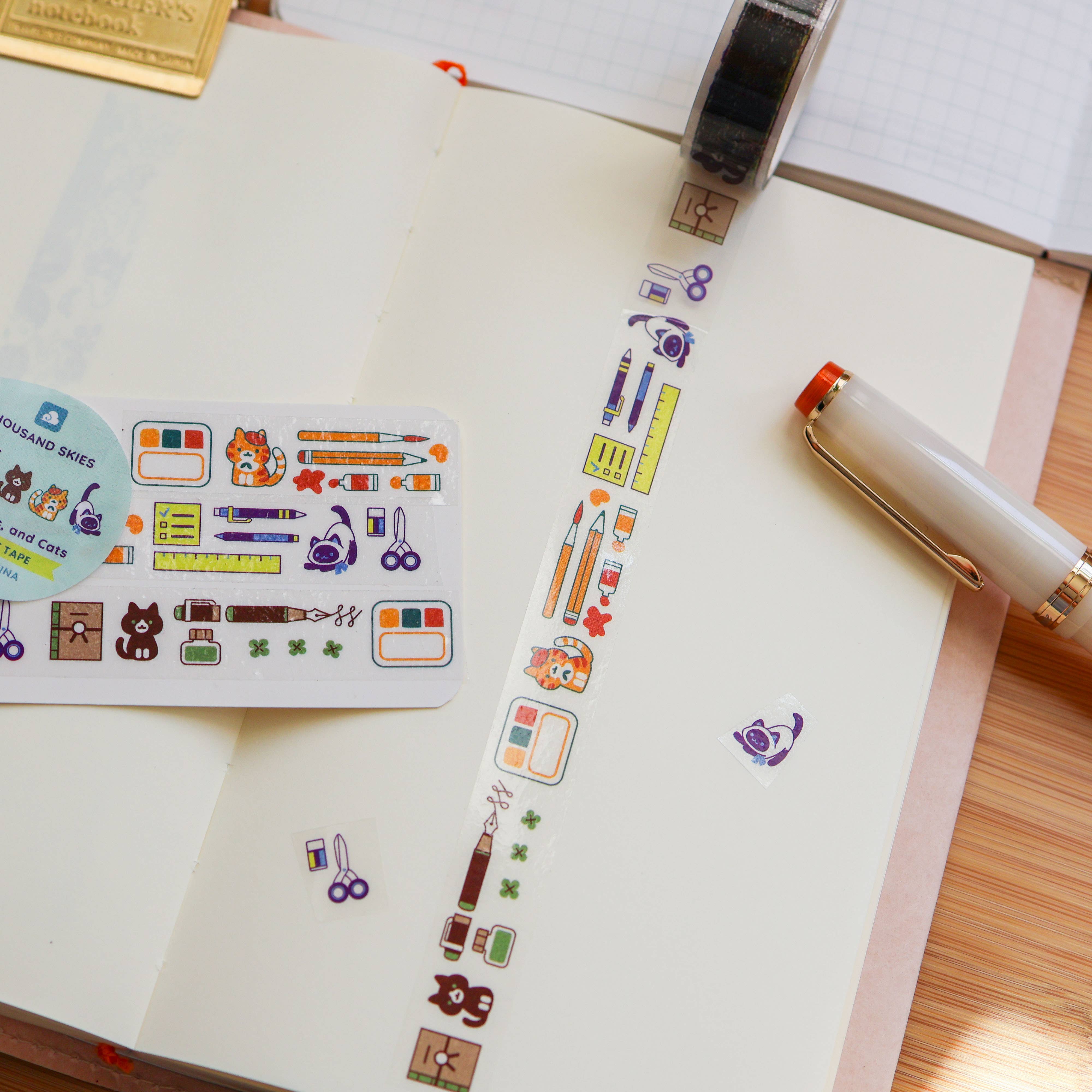 Brush, Pens, and Cats pet Tape
