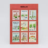 Sheet of Berlin-themed stamps on a red background