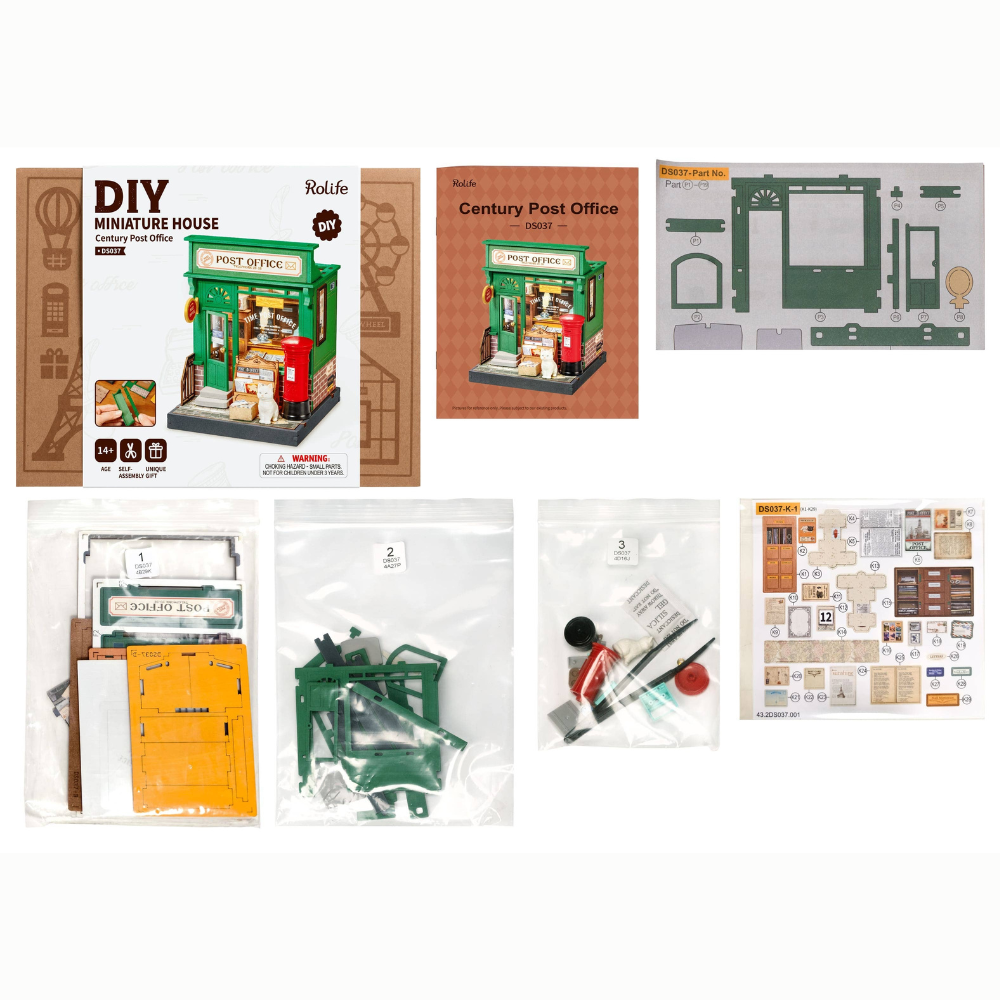 Collection of miniature house building kits with packaging on a white background