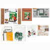 Collection of miniature house building kits with packaging on a white background