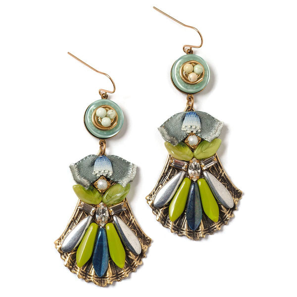 Colorful earrings with floral design on a white background