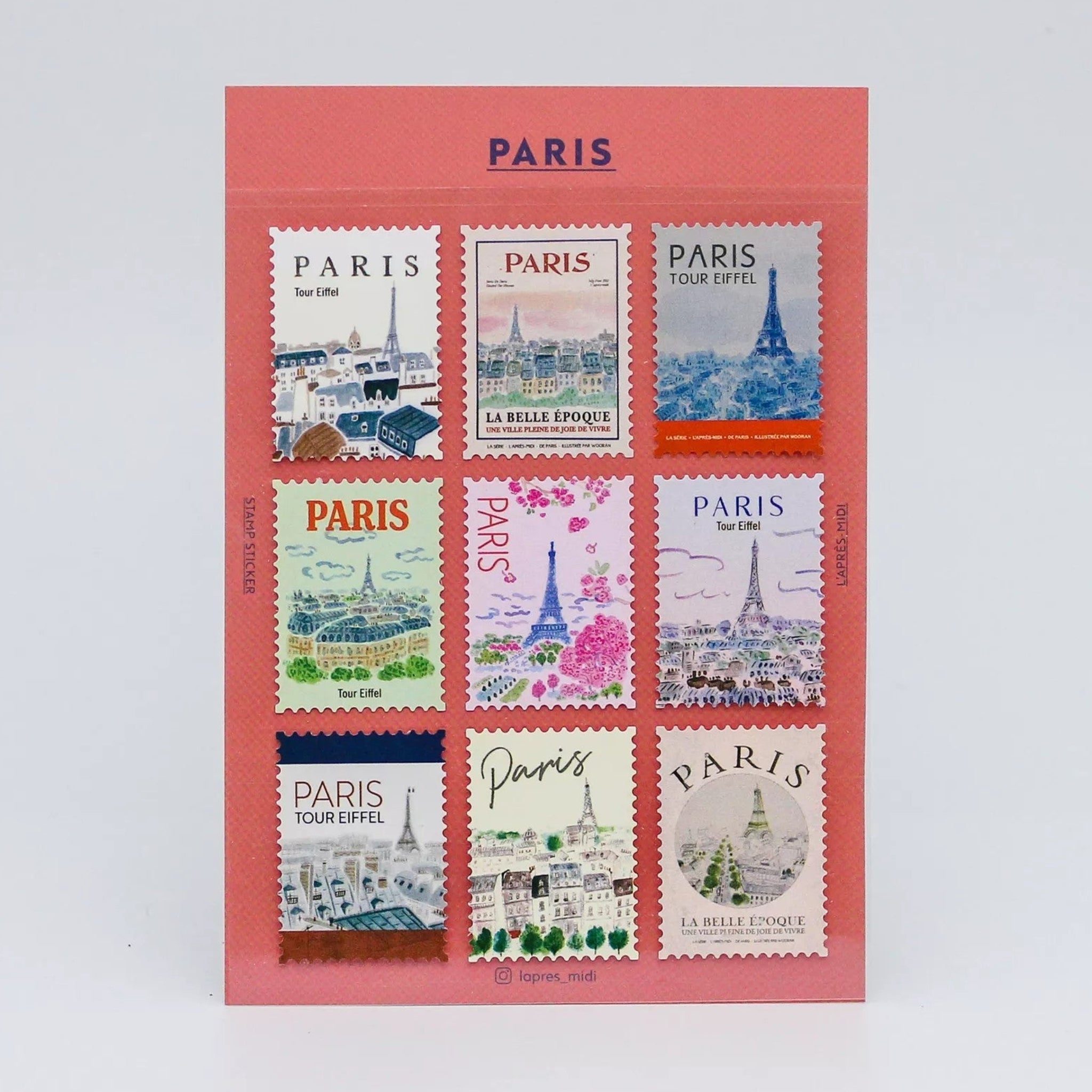 Collection of Paris-themed stamps on a pink card with 'PARIS' text.