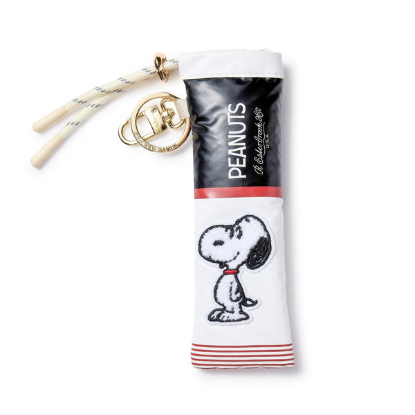 Peanuts-themed pen case with Snoopy design on a white background