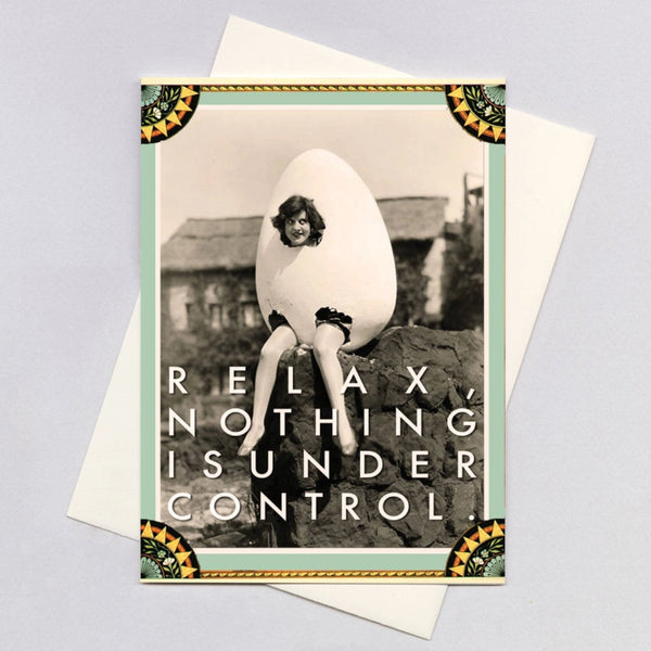 Card with vintage-style illustration of a woman in an egg (like Humpty Dumpty) with text reading  'Relax, nothing is under control', and decorative border.