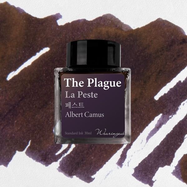 Ink bottle labeled 'The Plague' by Albert Camus on a textured brown and white background