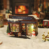 Miniature Christmas-themed toy shop with lights and decorations in a snowy setting.