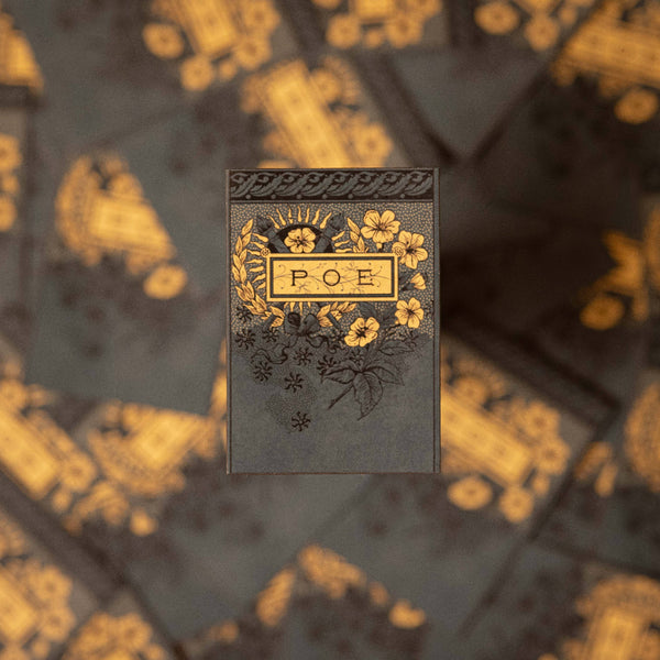Decorative book with 'POE' on a blurred background