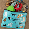 Dog accessory pouch with dog-themed design on a textured surface