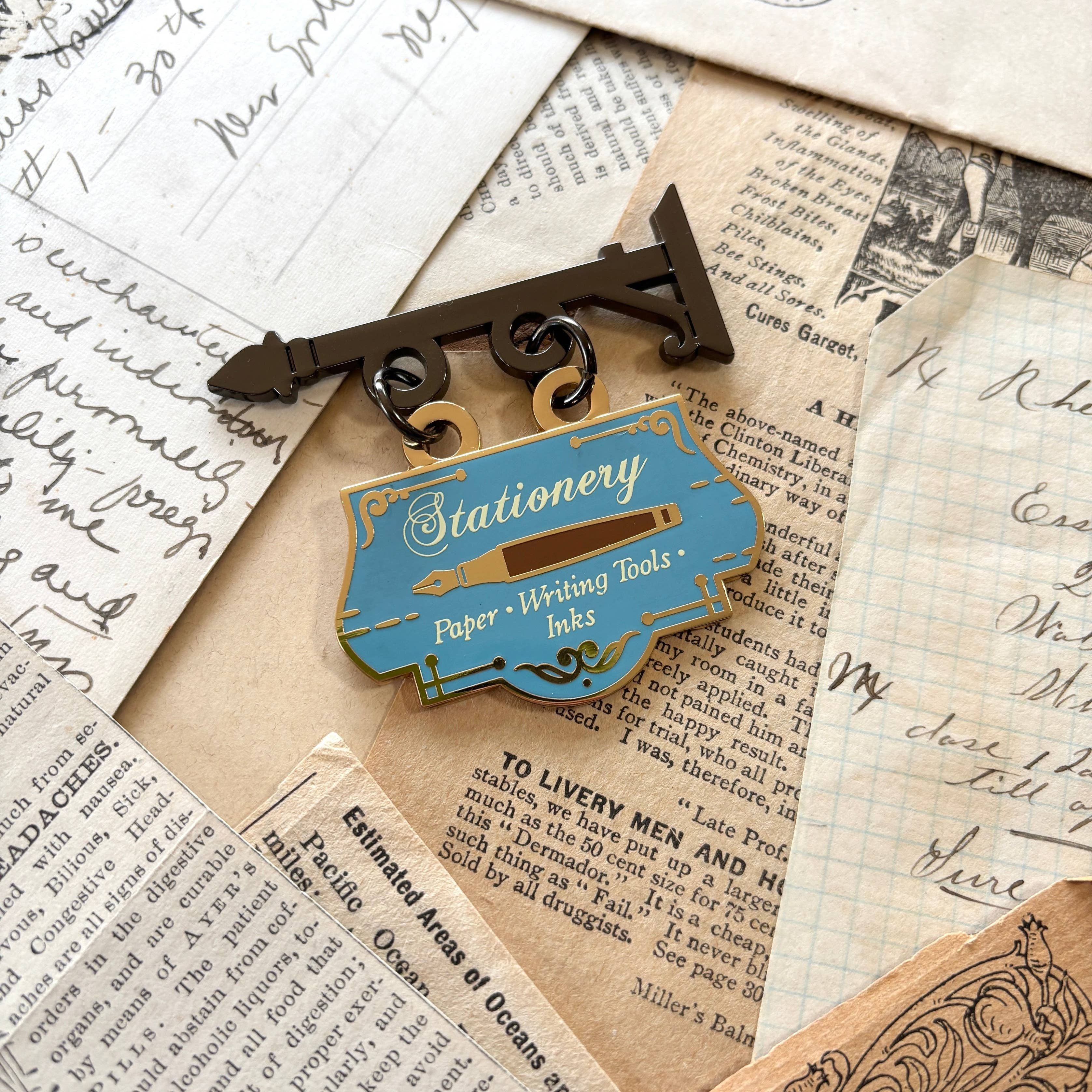 Stationery Store Hanging Sign Enamel Pin