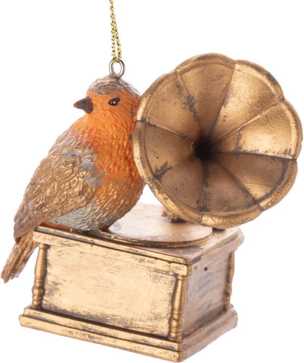 Oiseau sur ornements de gramophone doré